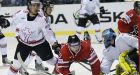 Canada escapes with OT win over pesky Swiss