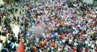 Syrian troops fire on mass protests, 14 dead