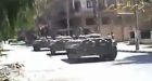 Syrians flee as tanks sweep into coastal city