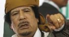 Gaddafi defiant amid rumours of exile