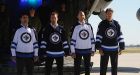 The home and away jerseys for the Winnipeg Jets