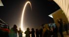 Soyuz blasts off for space station with three aboard