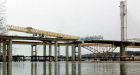 Crane drops section of Port Mann bridge into B.C. river