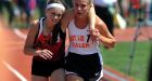 Meghan Vogel: Inspiring photo shows Ohio runner help carry competitor across finish line  | Mail Online