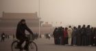 Smog and sandstorm engulf China's capital