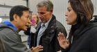 RCMP restrain Chinese reporter after tussle at Harper event