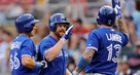 Lind homers twice, drives in 6 as Jays rout Twins