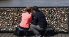 Paris installs glass panels on bridge amid fears of 'love lock' damage