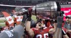 Grey Cup broken by celebrating Stampeders