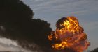 BNSF oil train derails in rural Illinois; two cars aflame