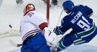 Canucks deny Canadiens NHL record-tying 10th win to start season