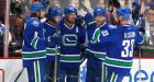 Sedins combine for 9 points in Canucks win over Blackhawks